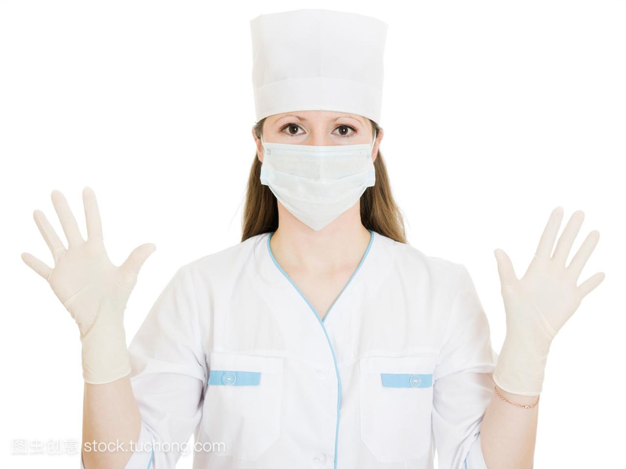 女医生戴上口罩和手套,在白色背景上的帽子