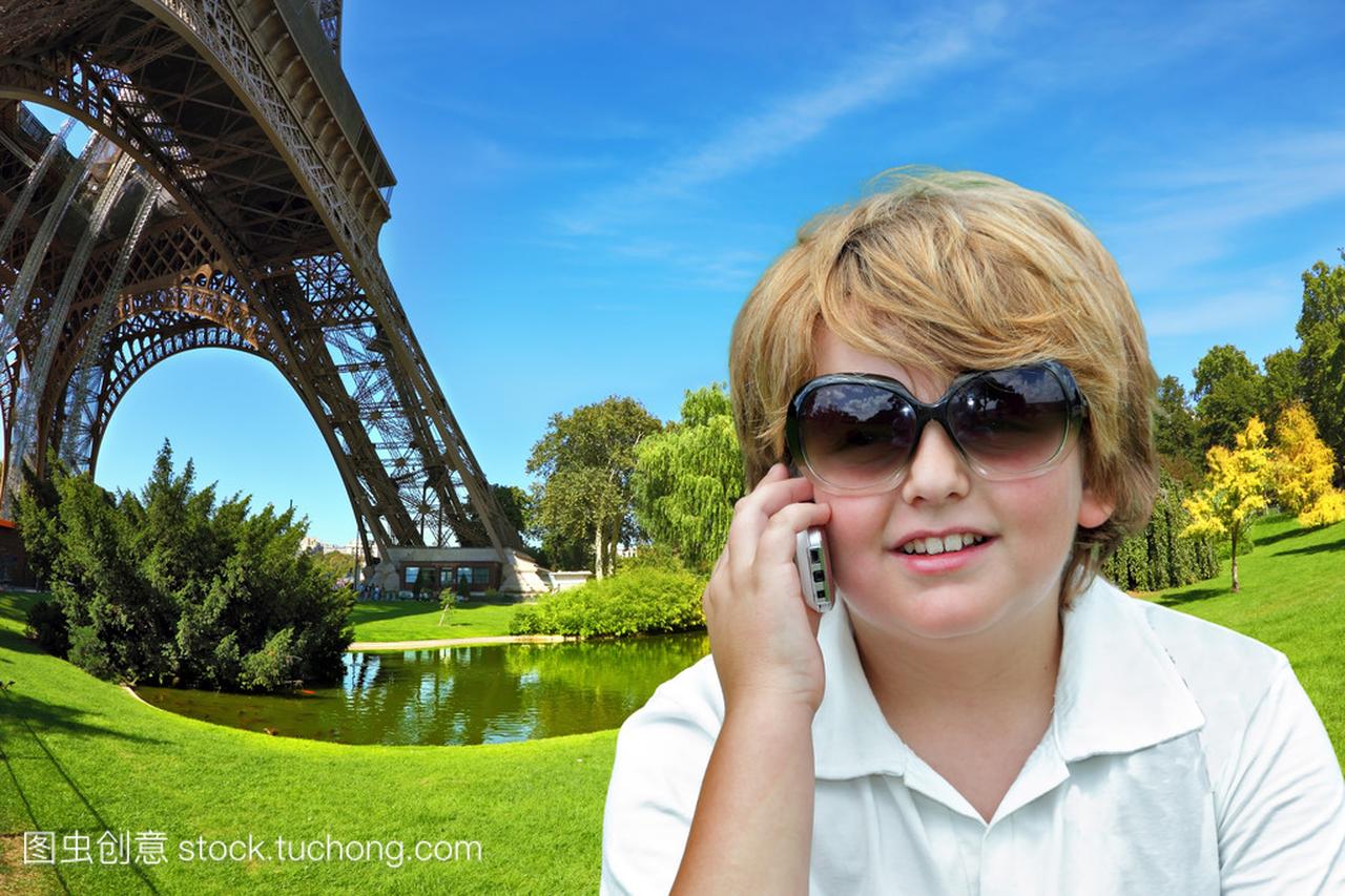 boy chatting on a cell phone