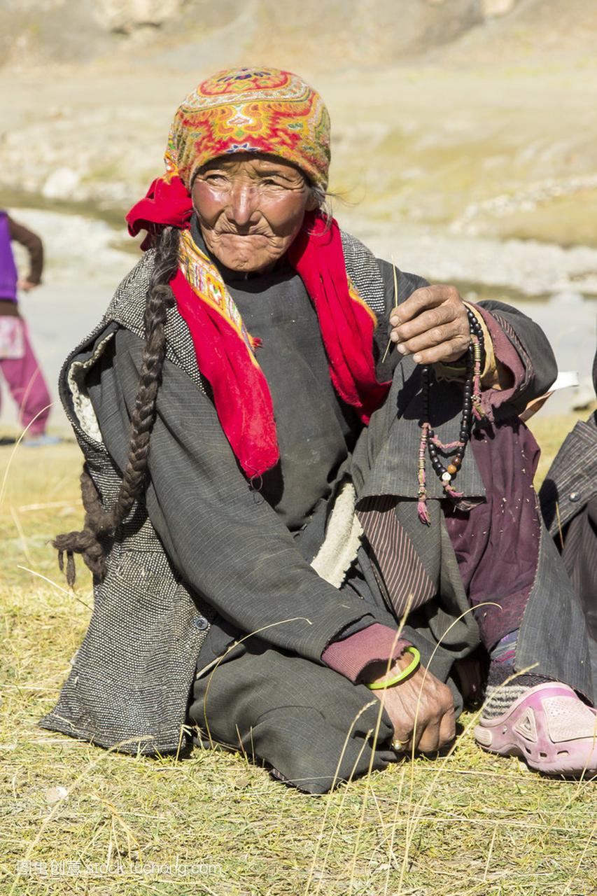 portrait of elderly tibetan woman