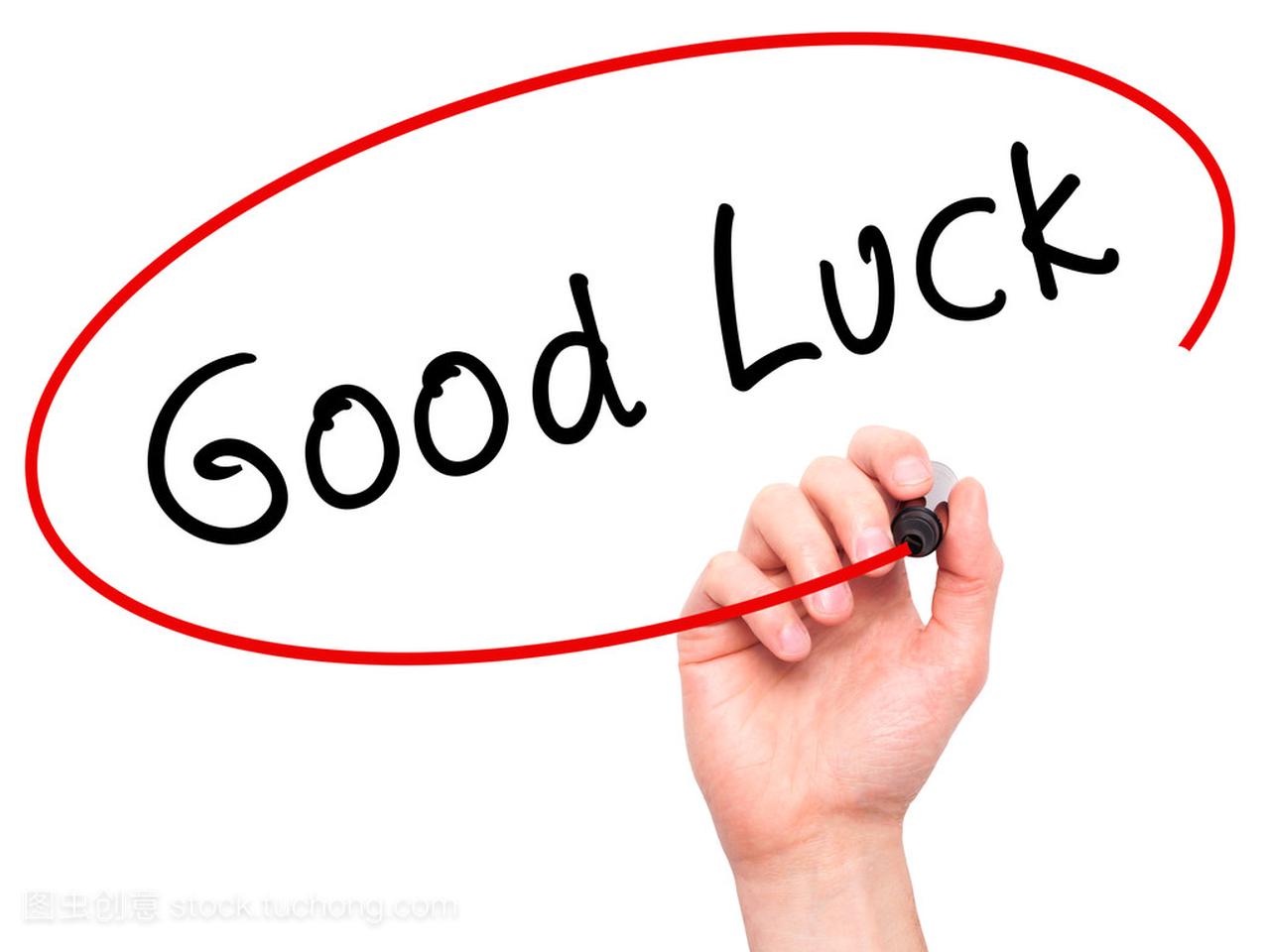 Man Hand writing Good Luck with marker on tra