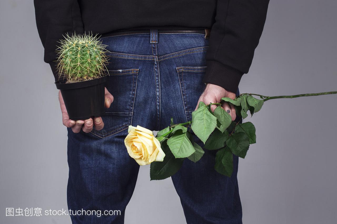 Handsome man Standing with Holding a Rose 