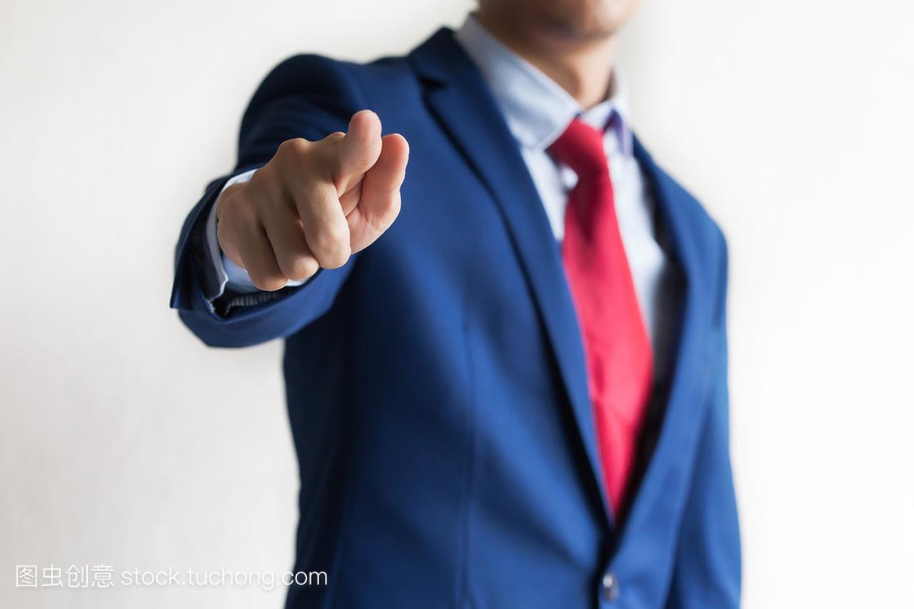 Confident business manager pointing at 