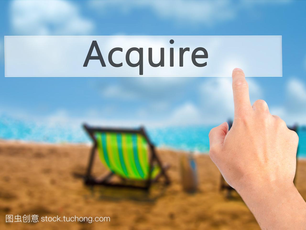 Acquire - Hand pressing a button on blurred 