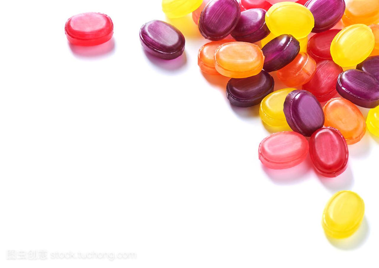 Pile colorful hard lollipop candies closeup