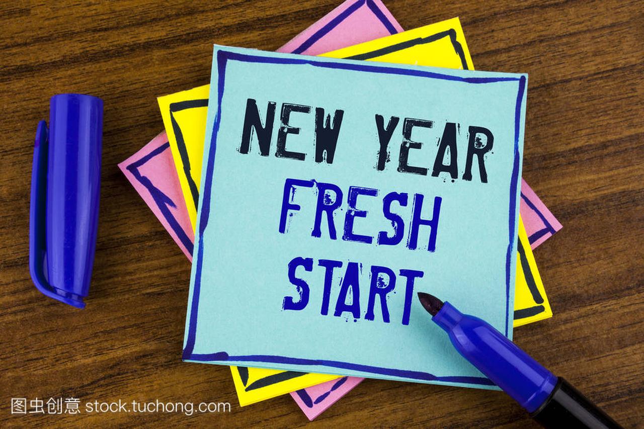 手写文字书写新的一年全新开始。概念意义时间