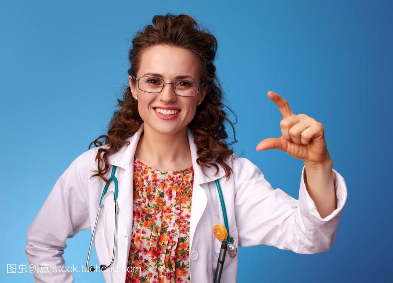 smiling pediatrician woman in white medical ro
