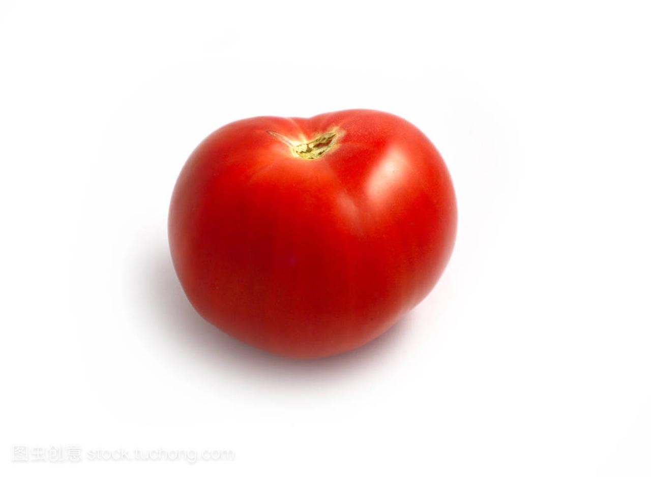 Delicious single fresh tomato. Photo 