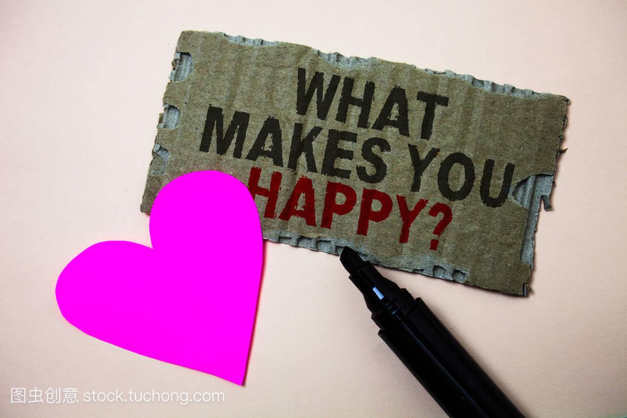 Text sign showing What Makes You Happy Question. Conceptual photo Happiness comes with love and positive life Brown paperboard rough ideas message heart wild love lovely intentions