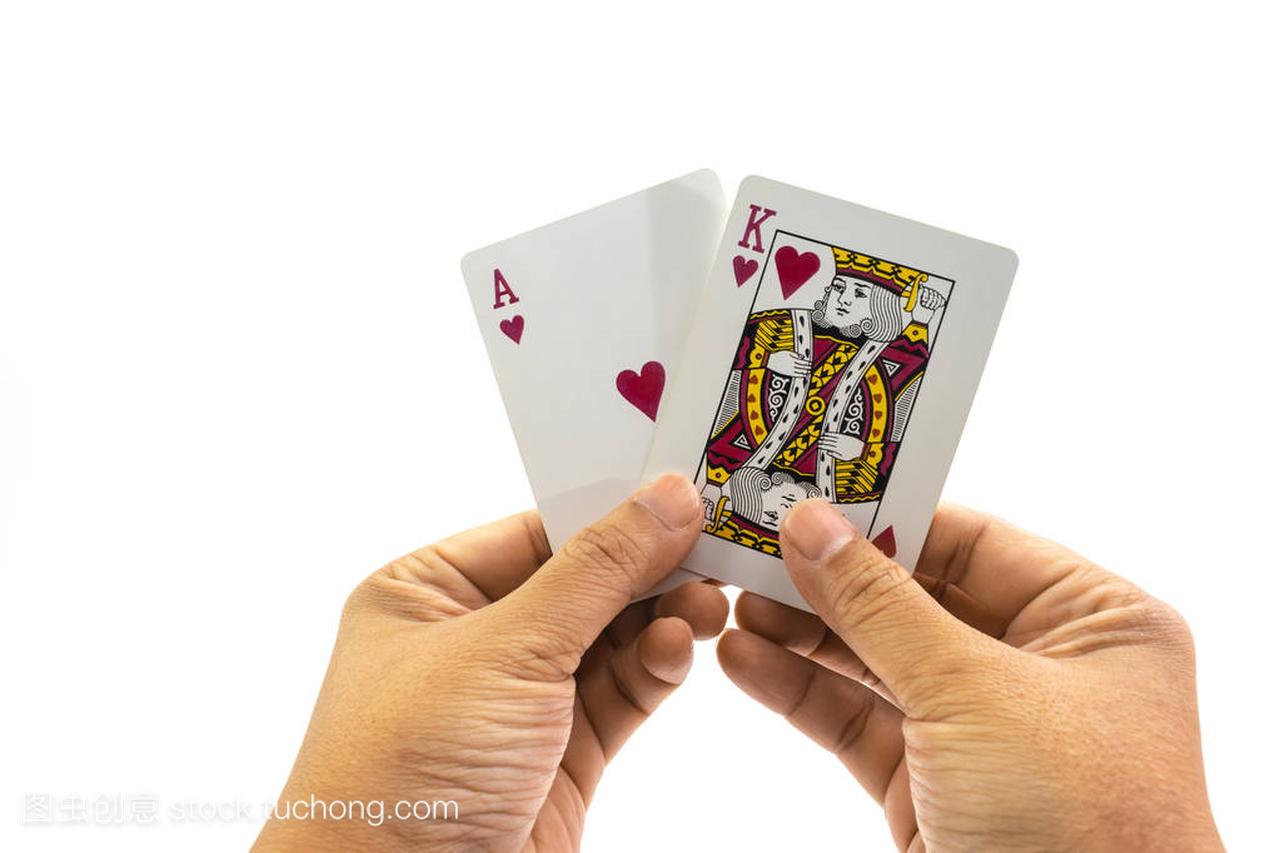 Poker heart King and ace in the hand of man is