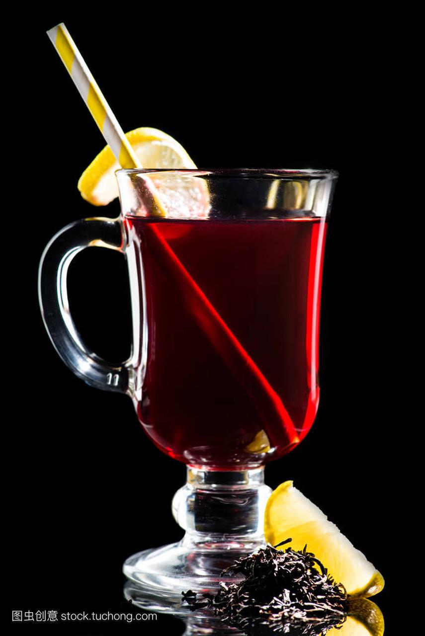 Hot cocktail with lemon, cherry juice and Assam