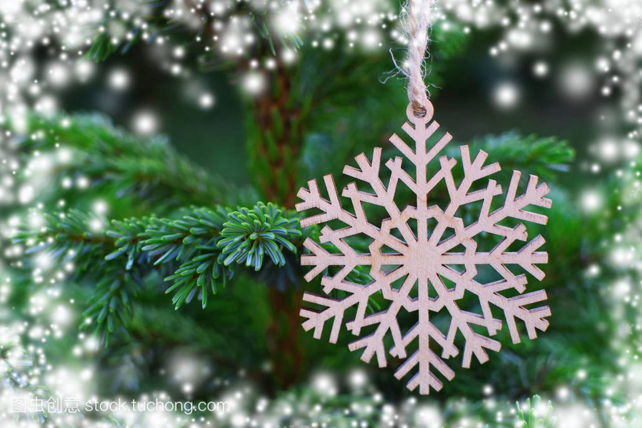nowflake on christmas tree as winter holiday de