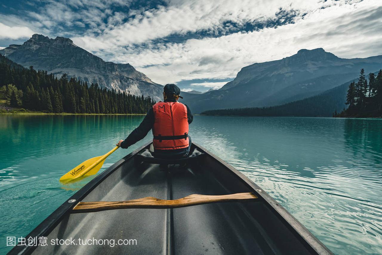 mountains canada with canoe and life vest 