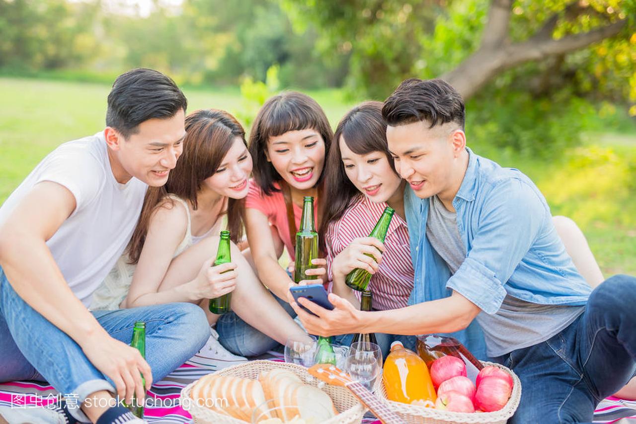 people enjoy beer and selfie happily go on a picnic