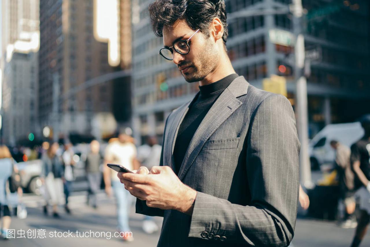 usinessman dressed in formal wear chatting on