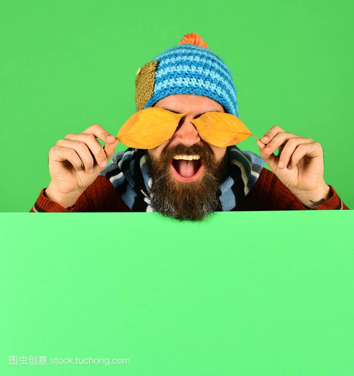 Hipster with beard and laughing face wears wa