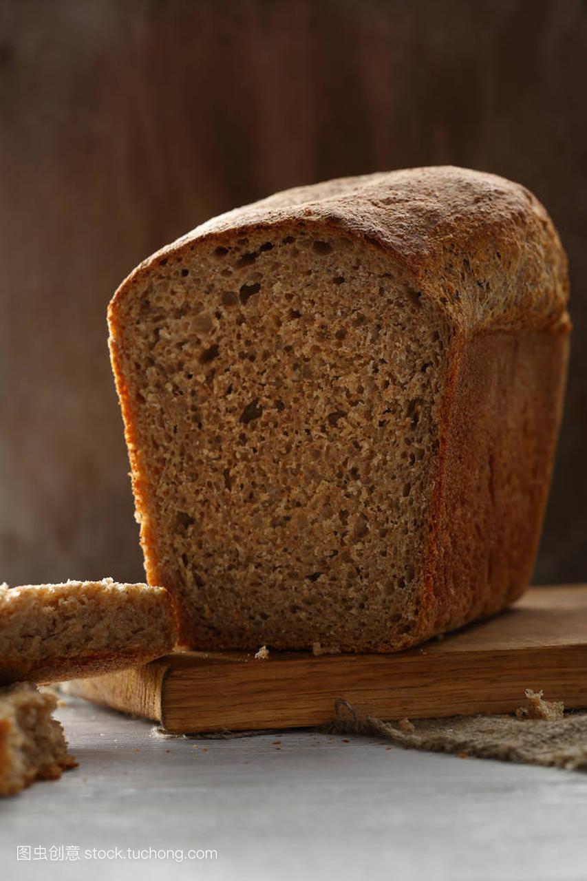 Loaf of brown cereals bread, food close-up