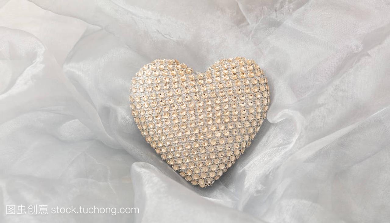 ve and marriage concept. Golden sequin heart,