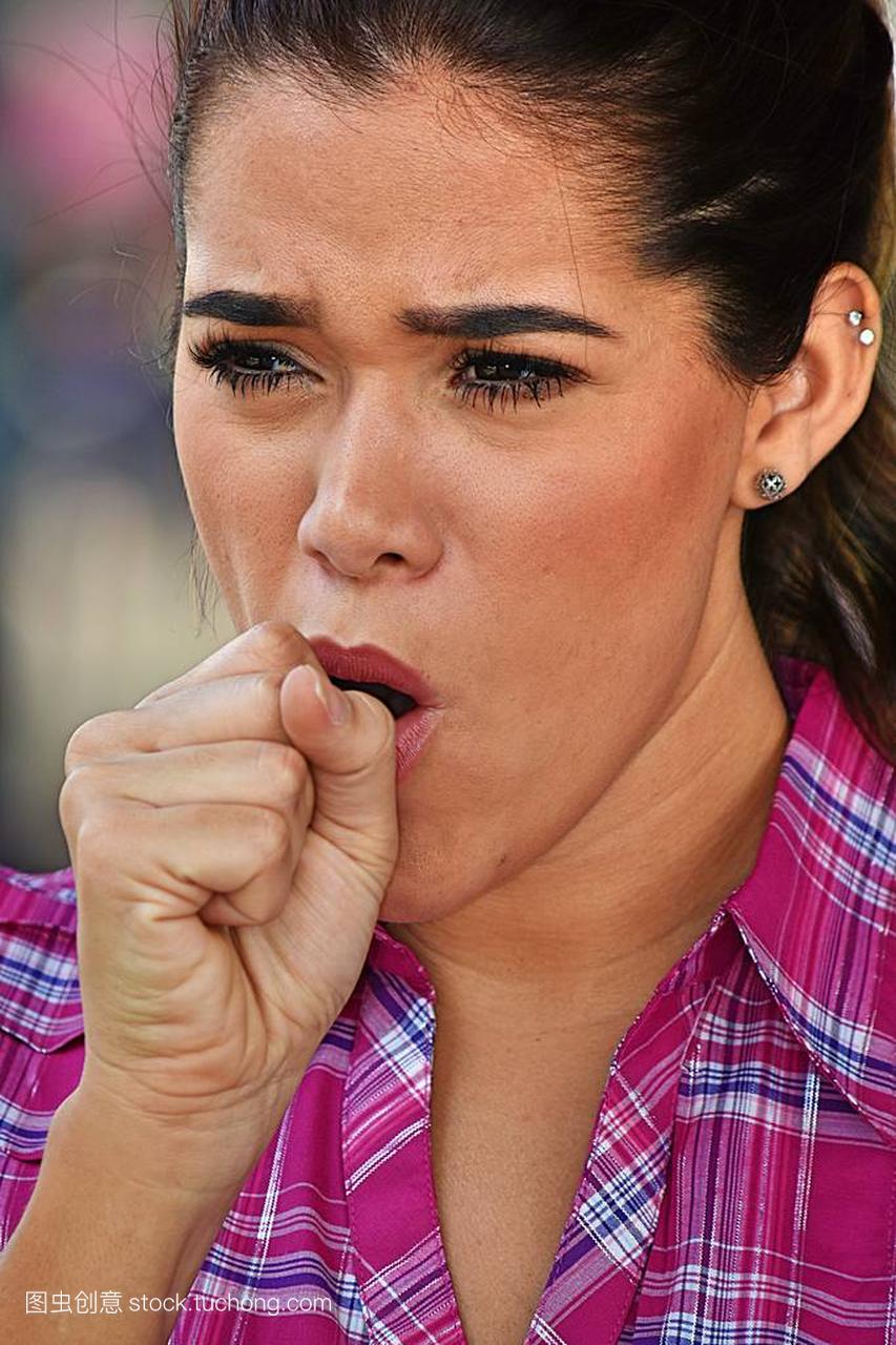 A Minority Female Coughing