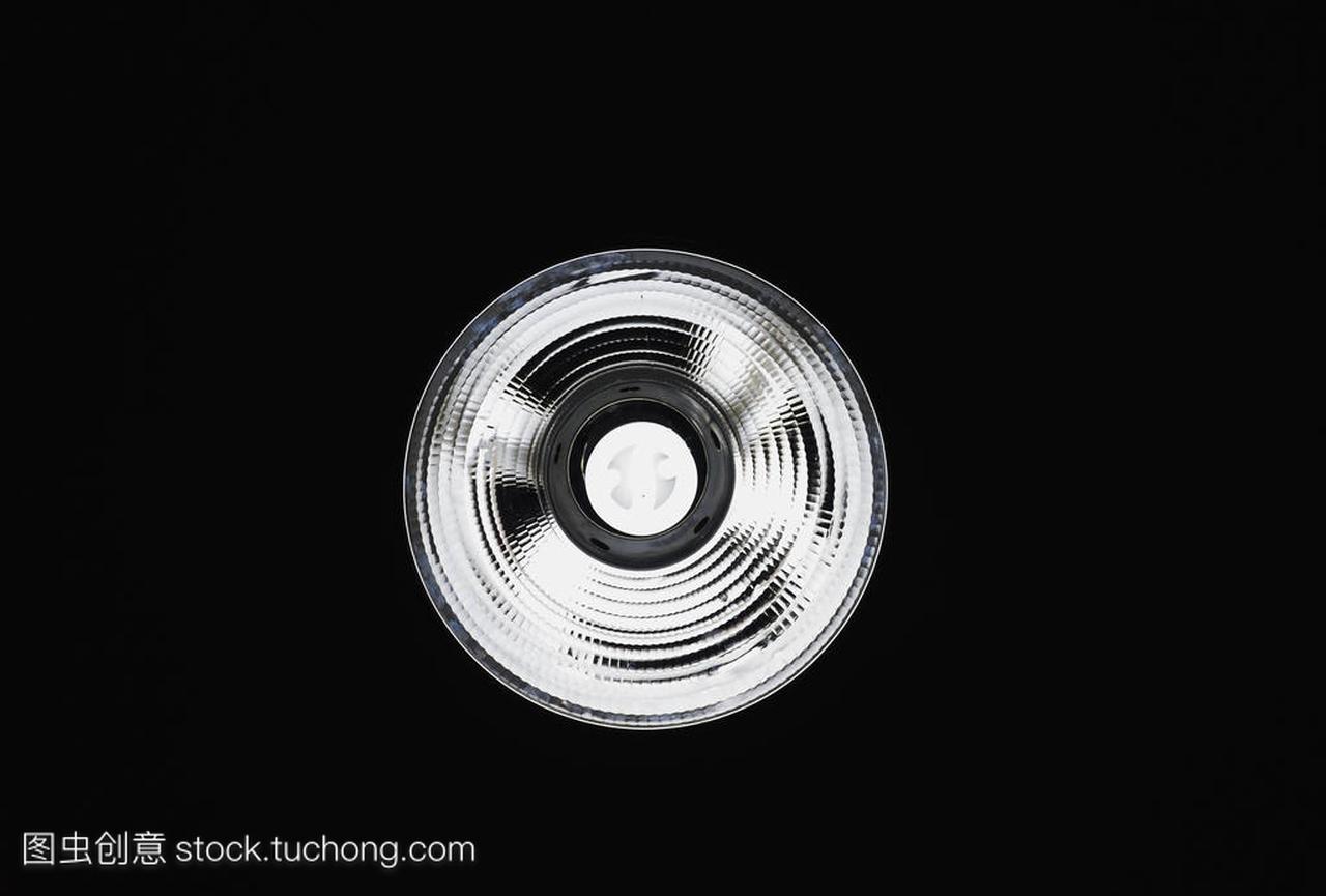 CFL Light Bulb in the Dark Ceiling background