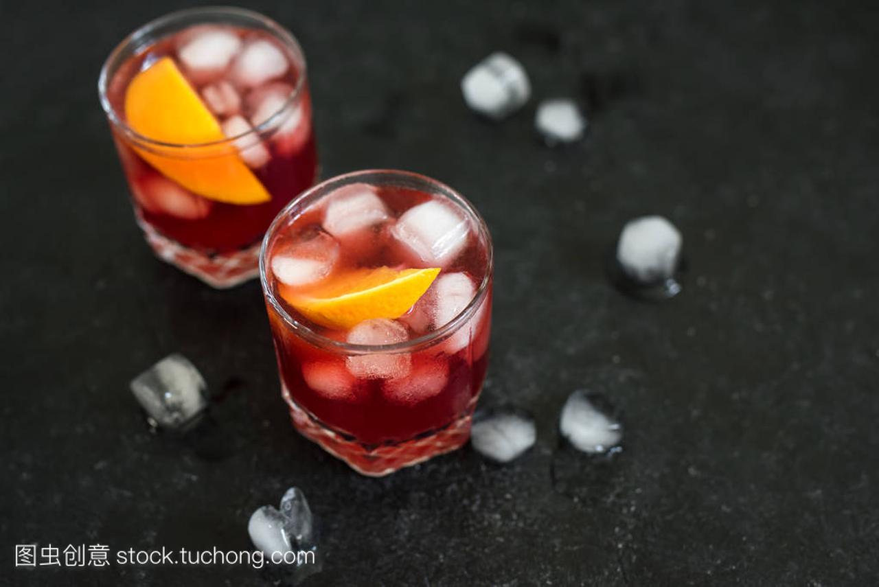 Negroni Cocktail with orange and ice. Homema
