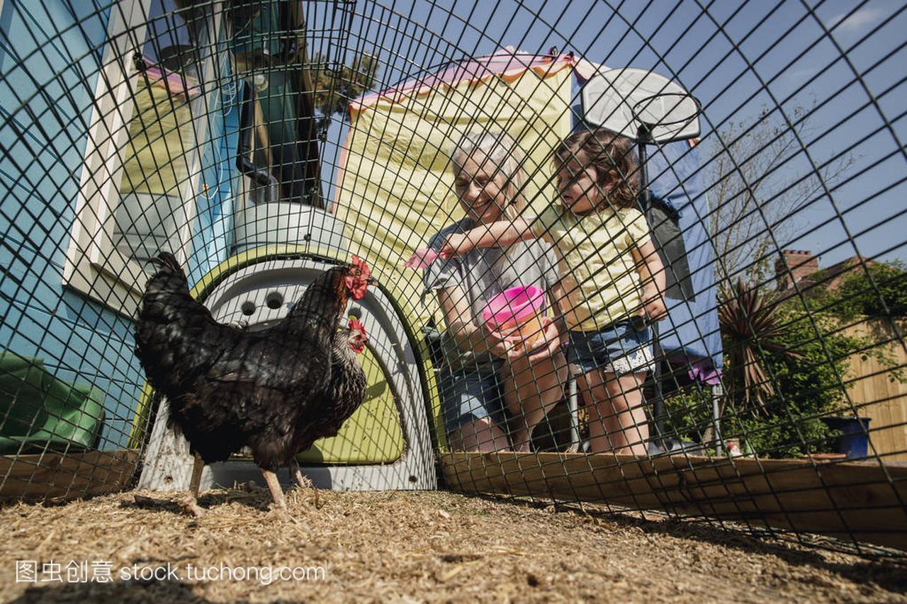 Low angle view of a little girl stood with her gran