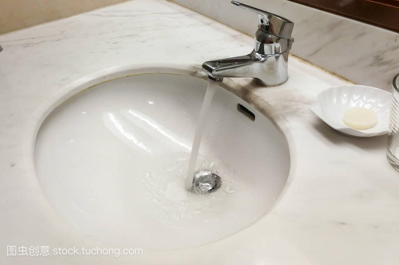 Modern hygienic wash basin with running water