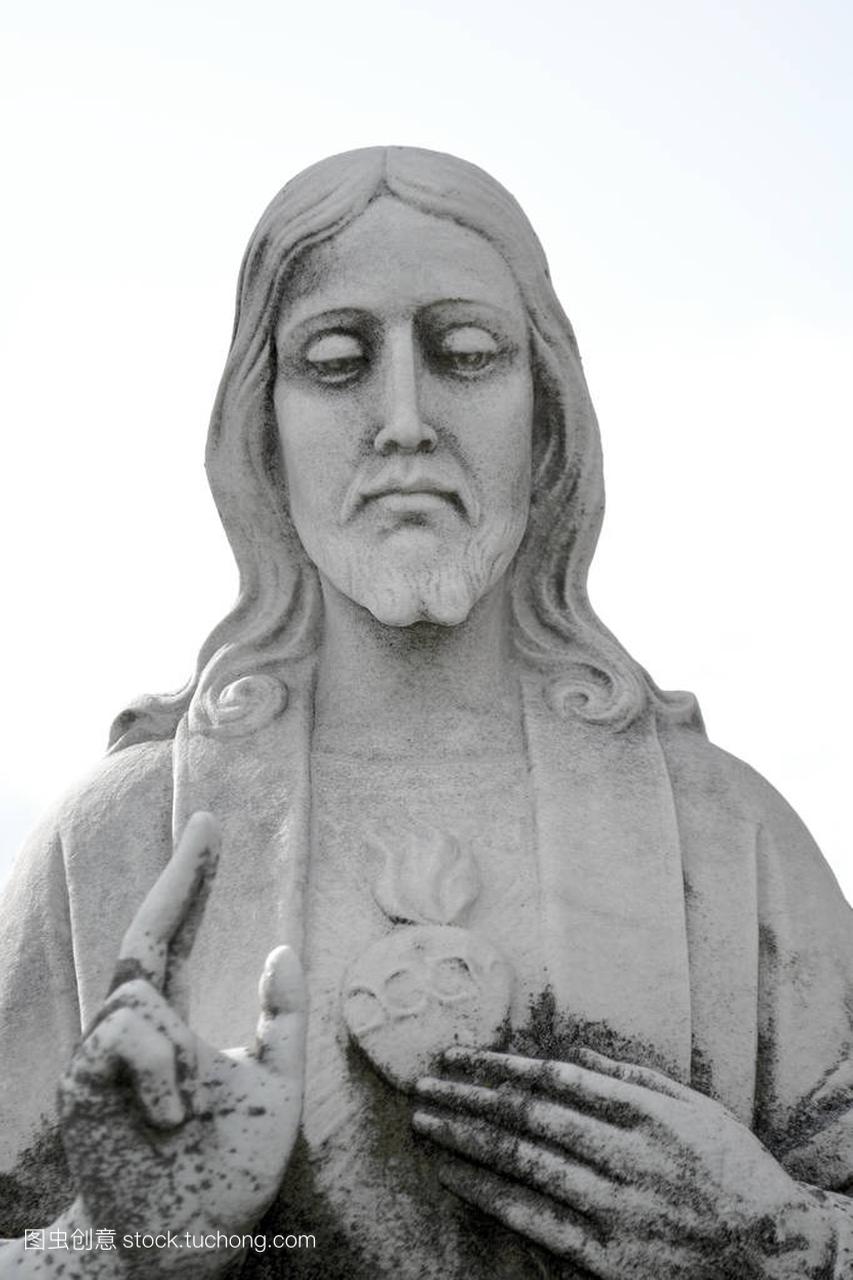 Jesus statue close up with Sacred heart. Jesus