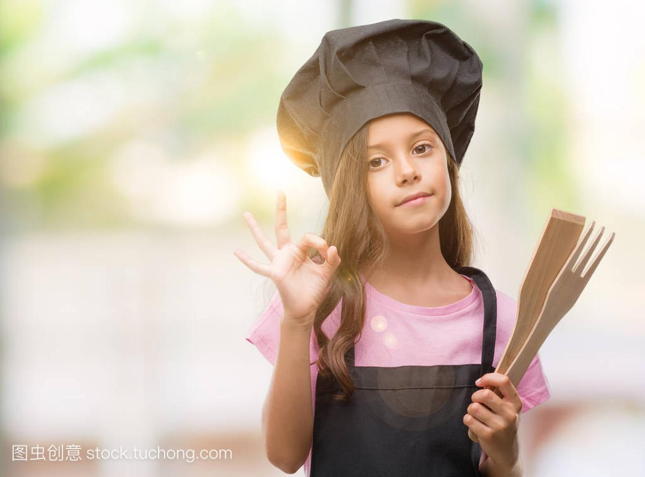 Brunette hispanic girl wearing cook uniform doi